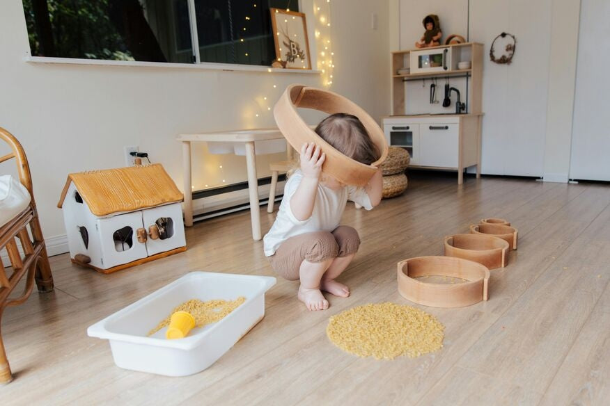 child playing in sensory playspace