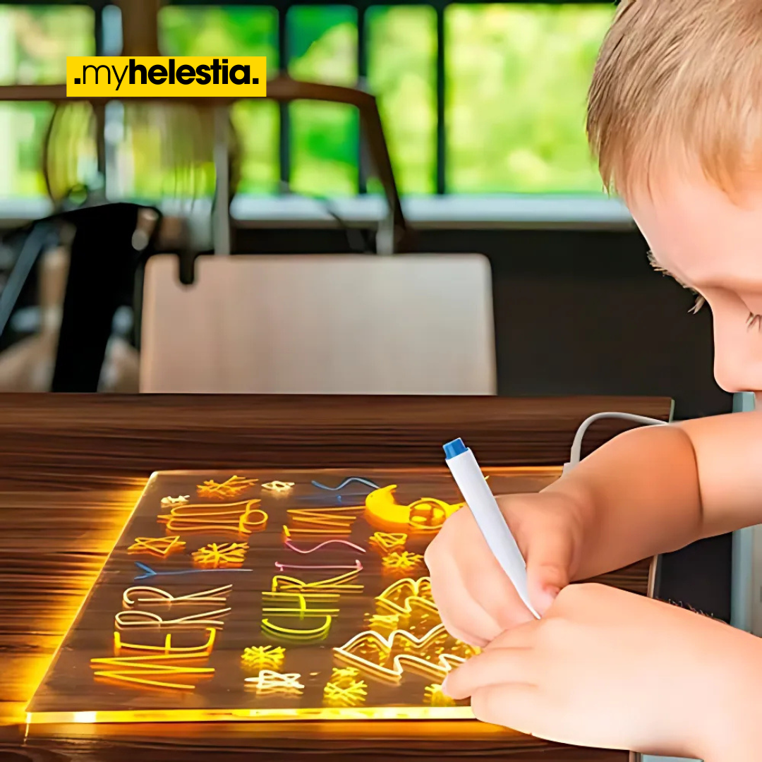Child drawing on toy